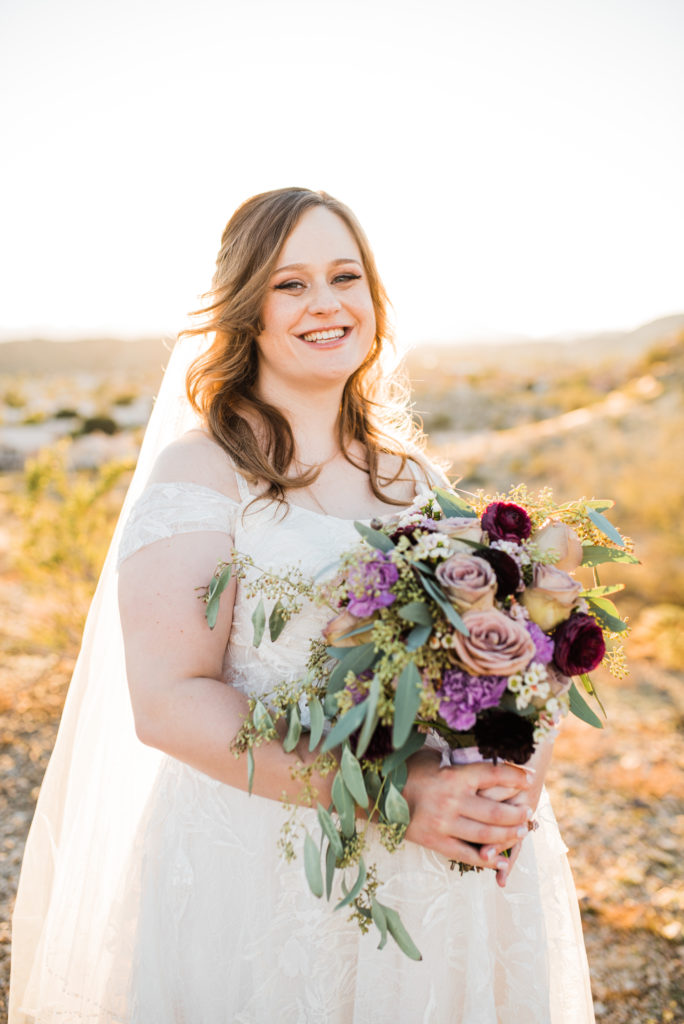 wedding bride portrait smiling with bouquet 