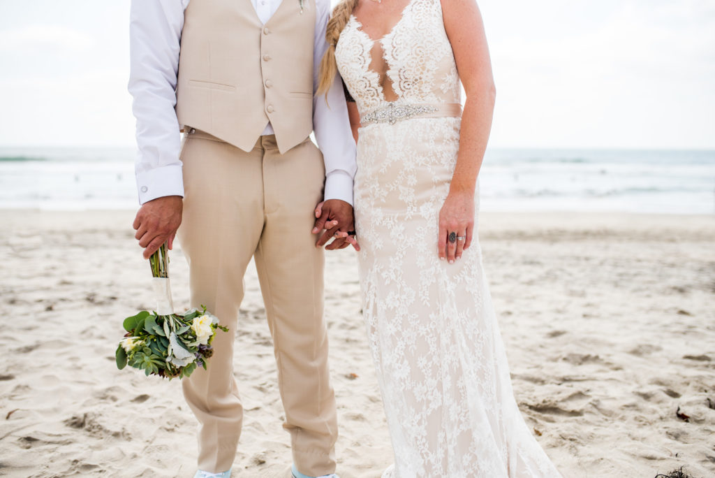 california dream beach wedding bride and groom portraits details of hands 