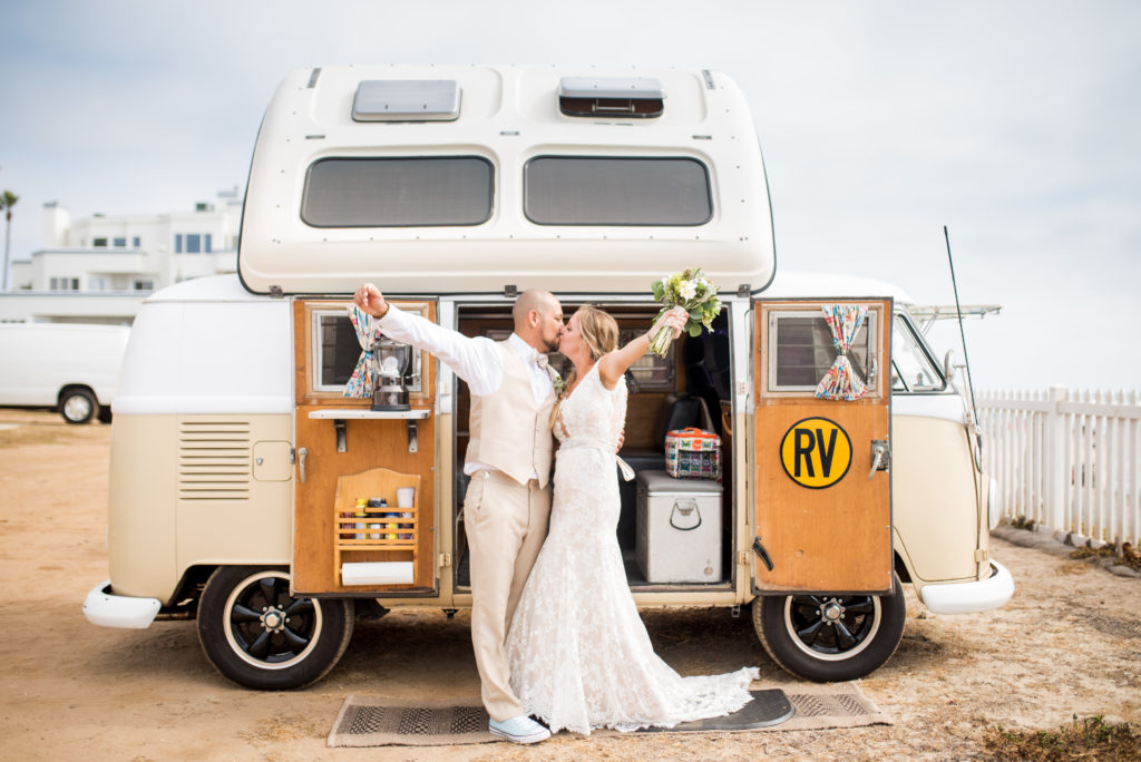 california dream beach wedding bride and groom portraits in front of a VW wagon bus travel and adventure 