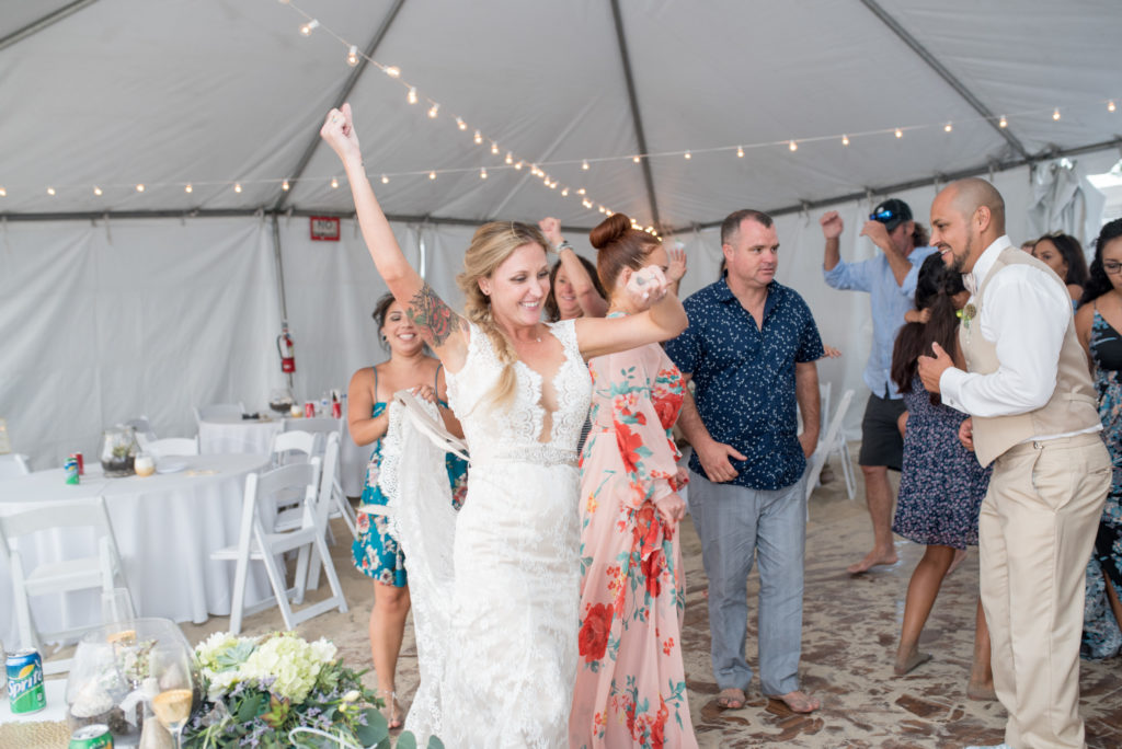 california dream beach wedding bride dancing in reception 