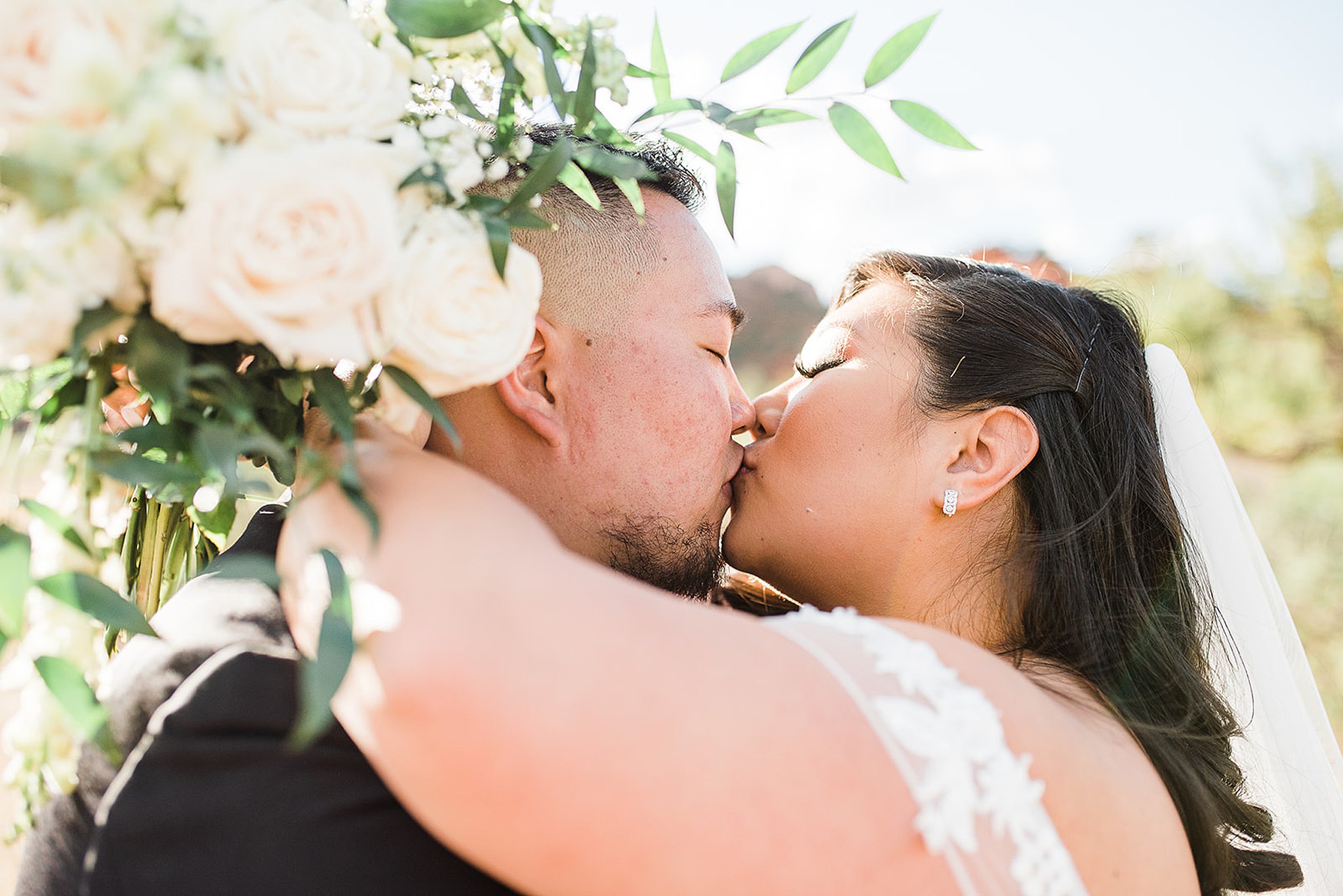 couple sharing a kiss at their Enchantment Resort wedding