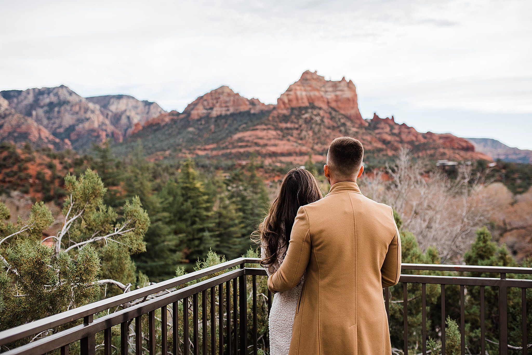 couple looking at the red rocks at a L'Auberge De Sedona proposal