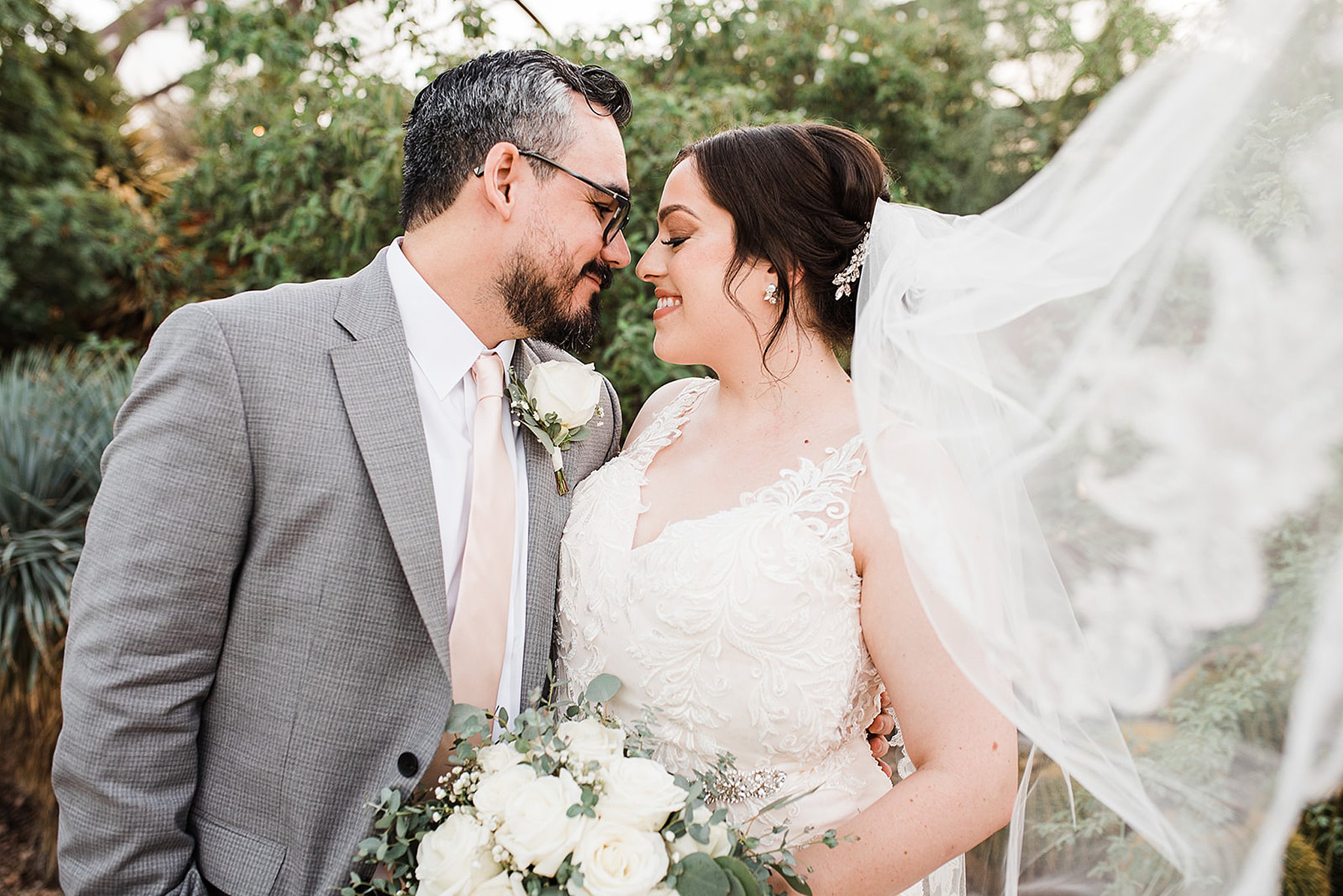 bride and groom with their foreheads together at their Agave of Sedona Wedding
